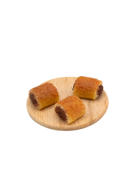 Sausage Rolls on a Wooden Board | Three Pieces