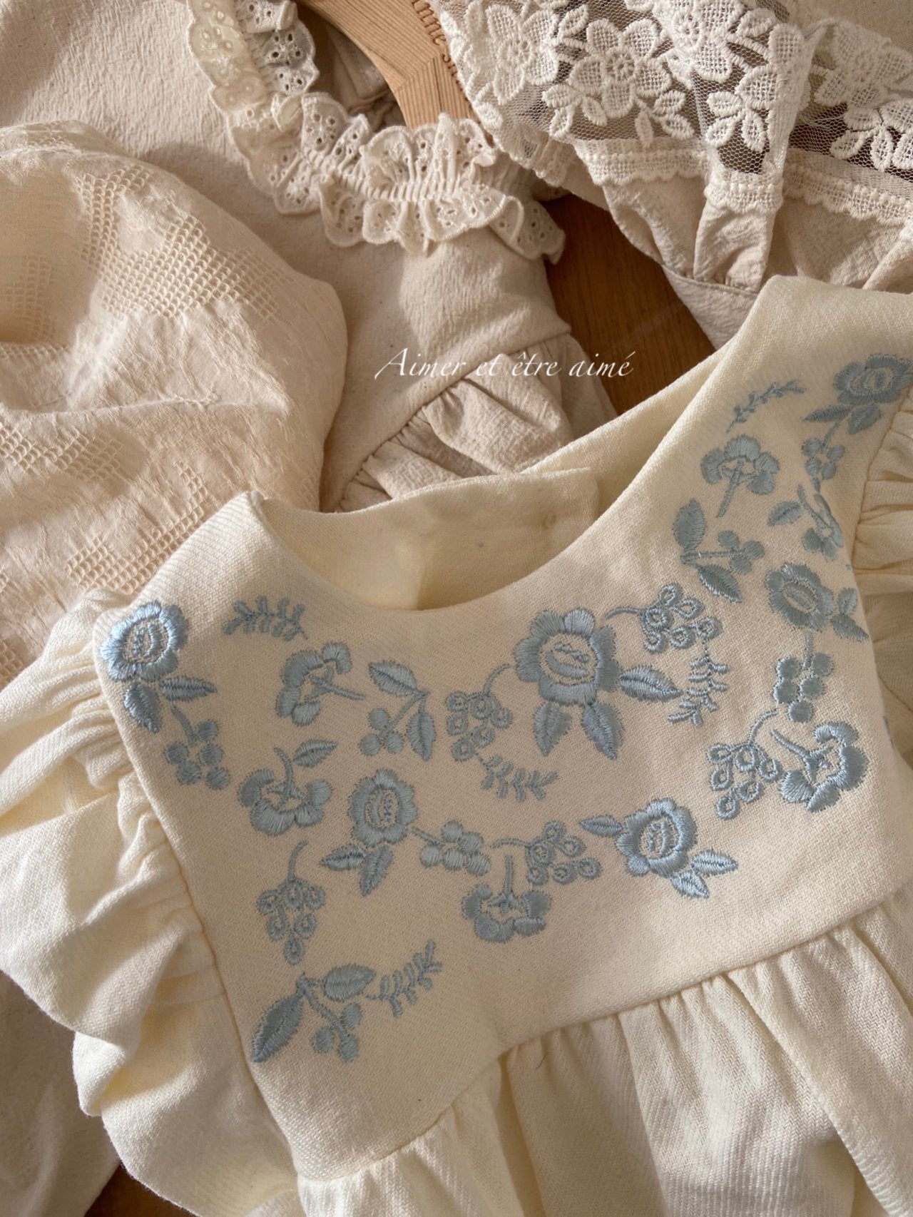 Eden Embroidered Blue Bodysuit